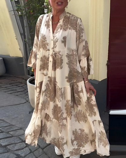 Vestido com estampado botânico e corte que realça a sua silhueta